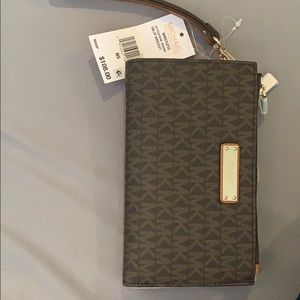 Brown Michael Kors Wristlet.
